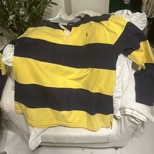 A medium sized, Ralph Lauren dark blue and yellow stripped sweater